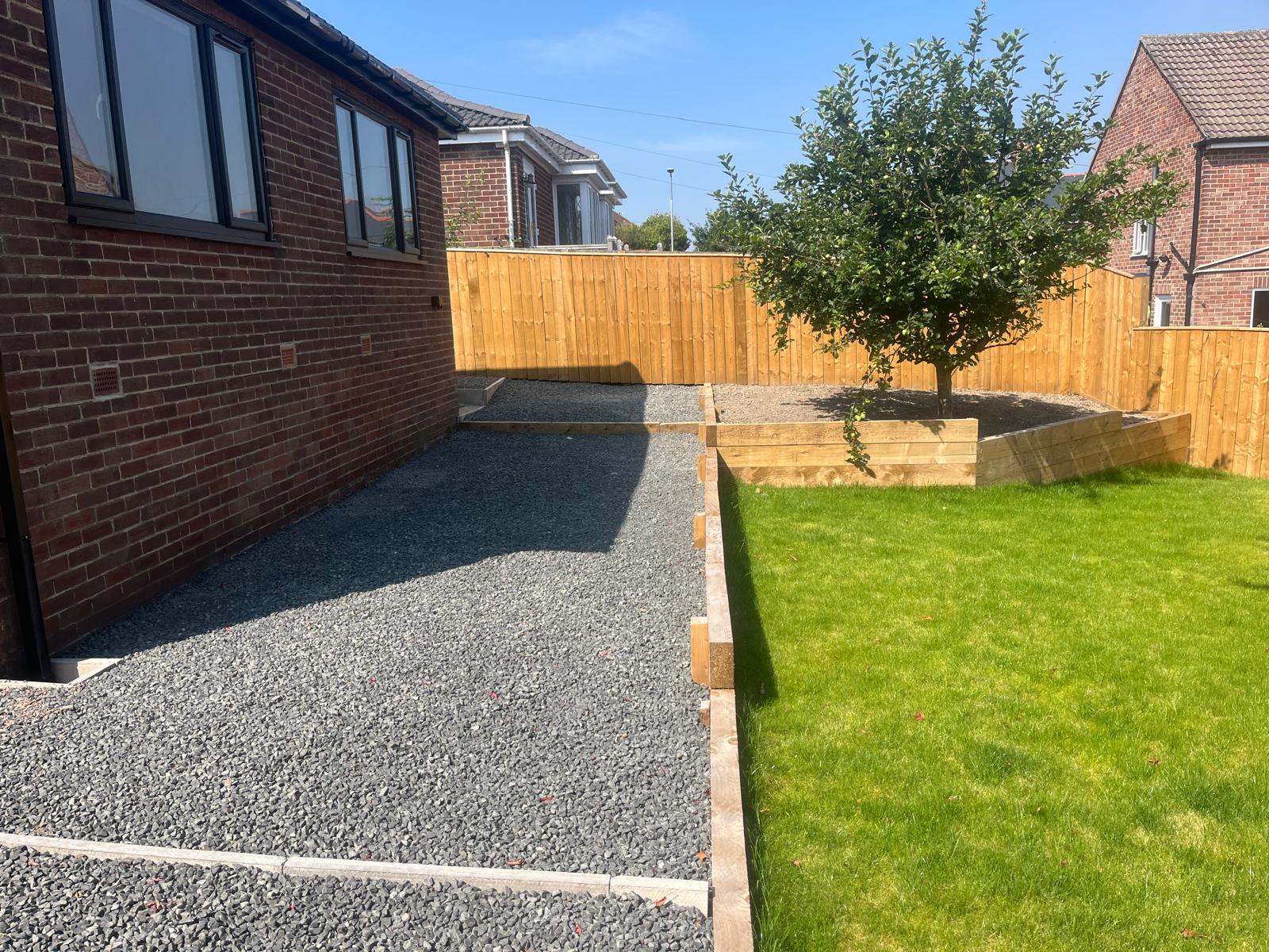 Gravel driveway and lawn