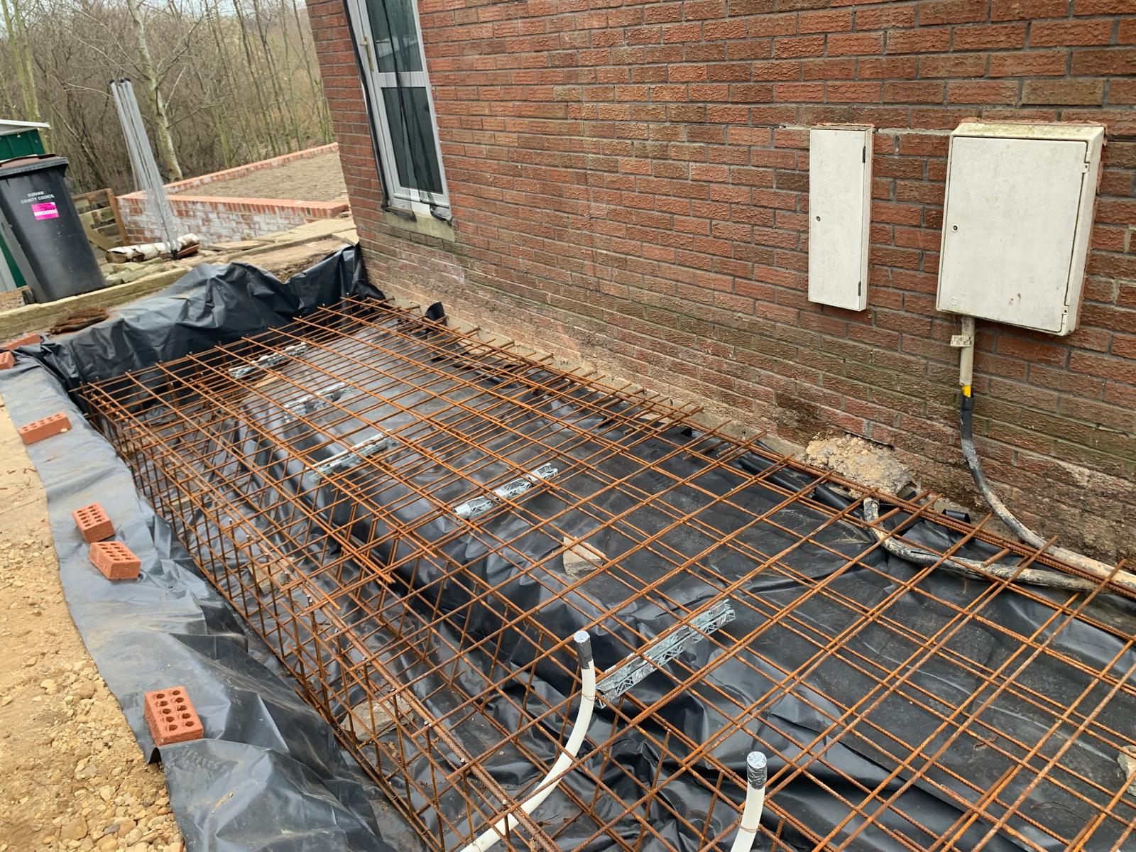 Reinforced slab and groundworks