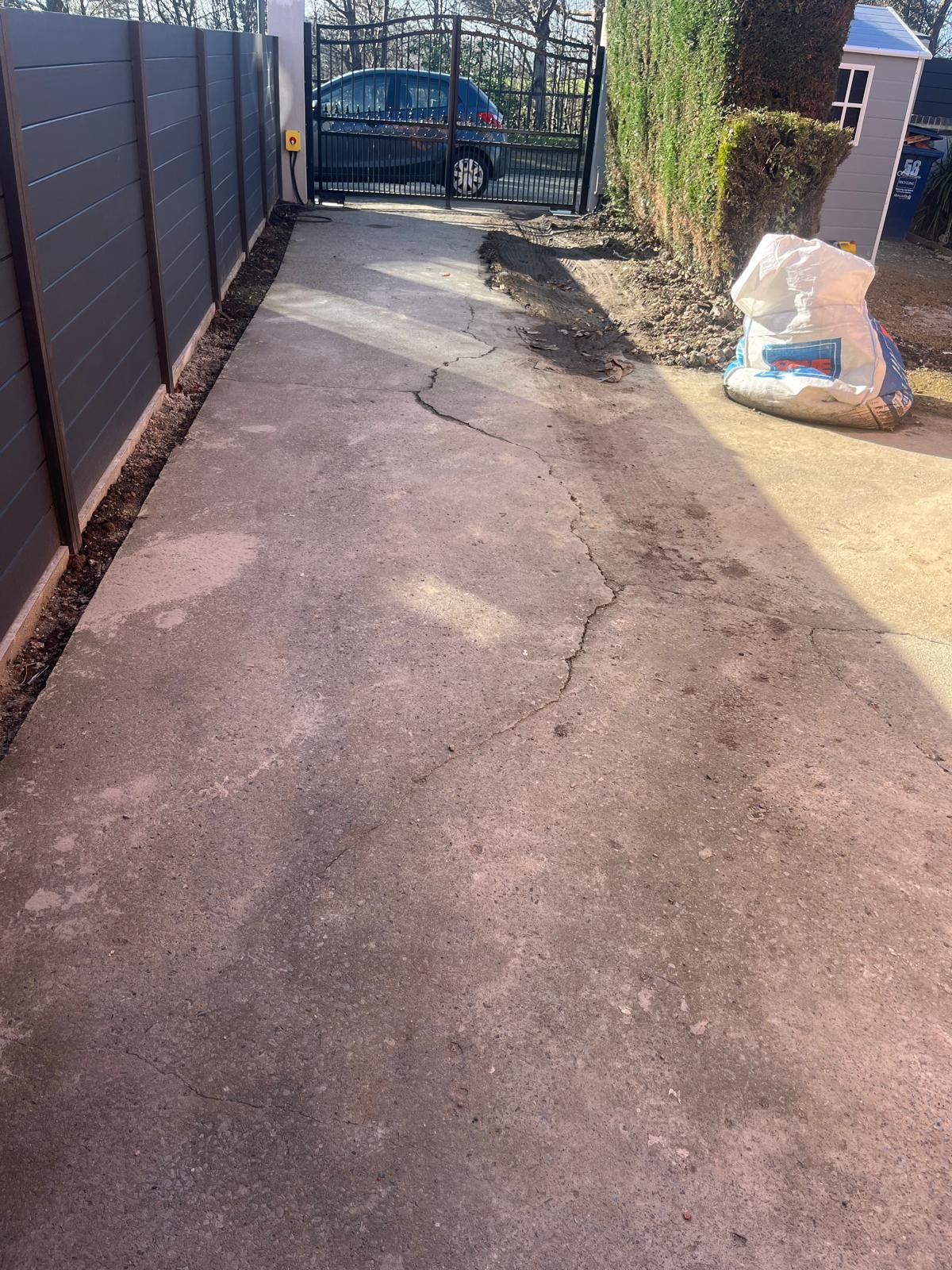 Resin driveway over old tarmac before the work
